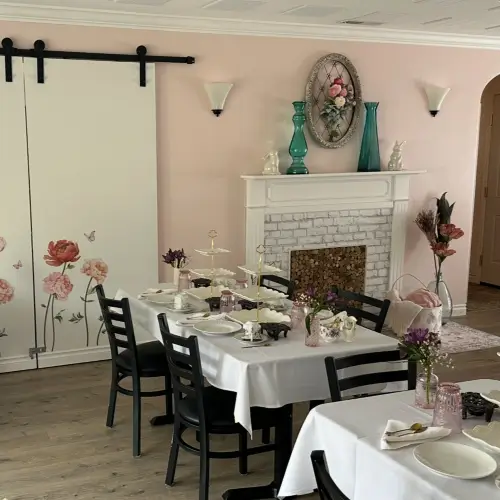 Tea room showcase with several tables and decorations | Honey Bunny’s Tea House